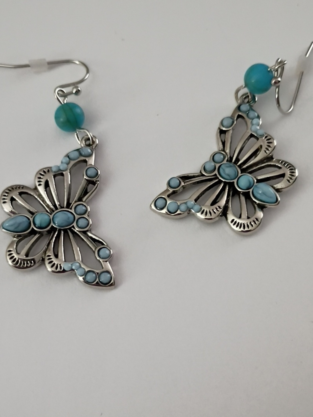 Jessica Simpson Silver Butterfly Earrings with Turquoise Accents